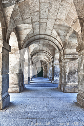 Image of Series of Stone Arches Leading to a Door