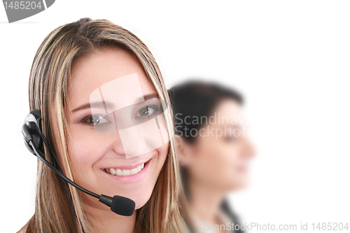 Image of Beautiful representative smiling call center woman with headset.