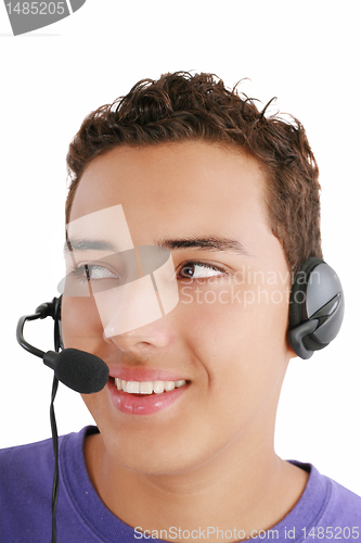 Image of Smiling businessman talking on headset against a white backgroun