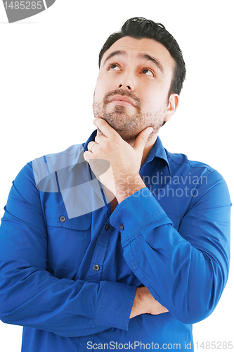 Image of Young man in thoughtful pose. Isolated over white. 