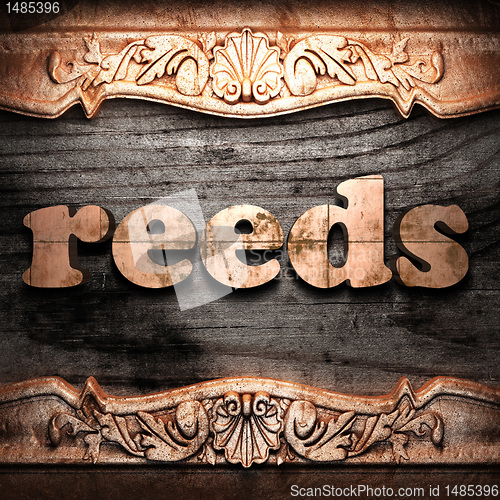 Image of Golden word on wood
