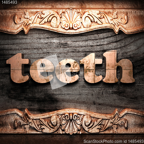 Image of Golden word on wood