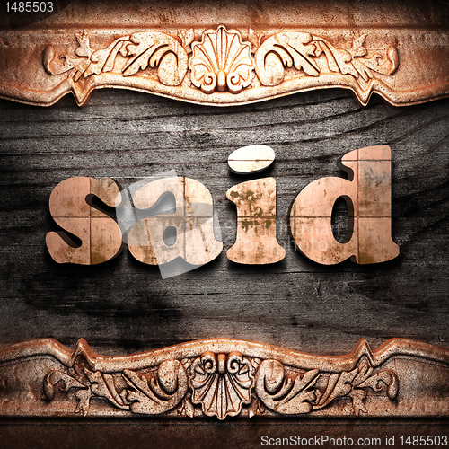 Image of Golden word on wood