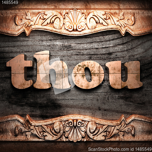 Image of Golden word on wood