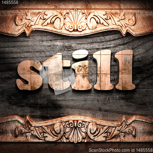 Image of Golden word on wood