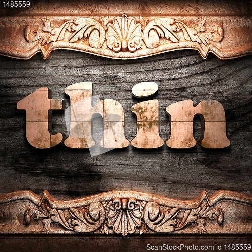 Image of Golden word on wood