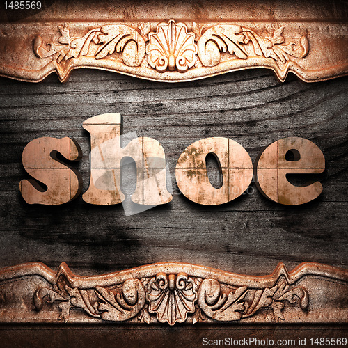 Image of Golden word on wood