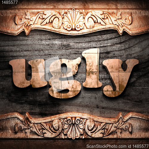 Image of Golden word on wood