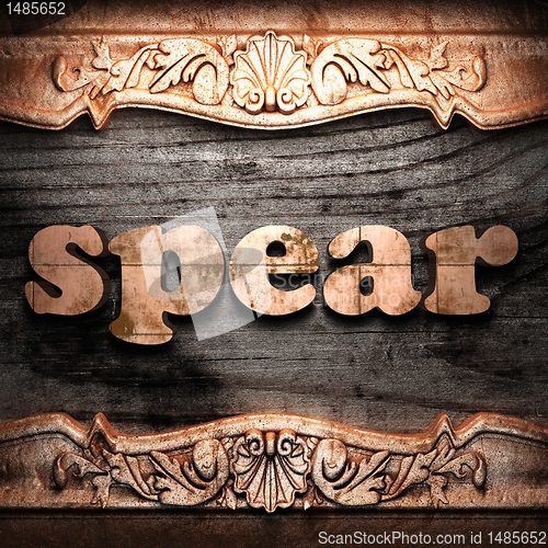 Image of Golden word on wood