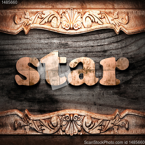 Image of Golden word on wood