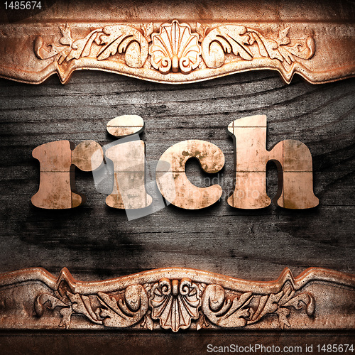 Image of Golden word on wood