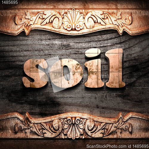 Image of Golden word on wood