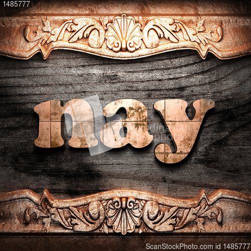 Image of Golden word on wood