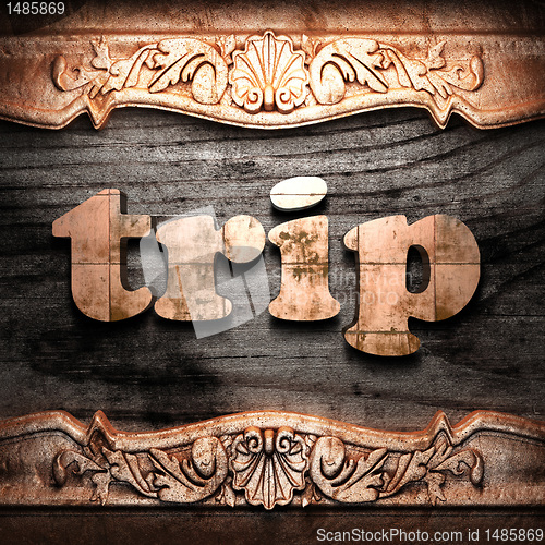Image of Golden word on wood