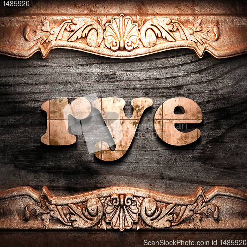 Image of Golden word on wood