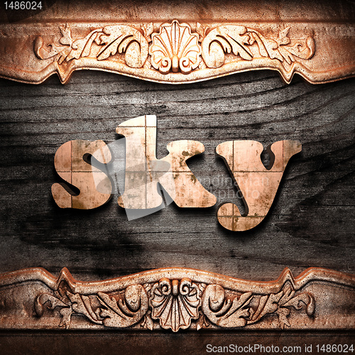 Image of Golden word on wood