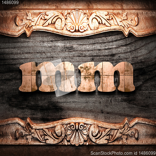 Image of Golden word on wood