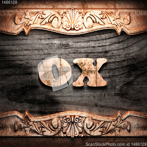 Image of Golden word on wood
