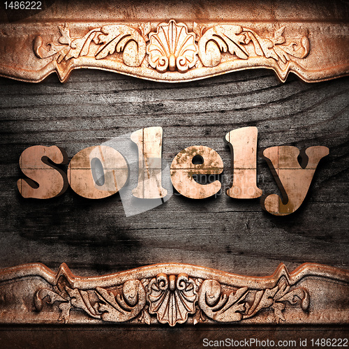 Image of Golden word on wood