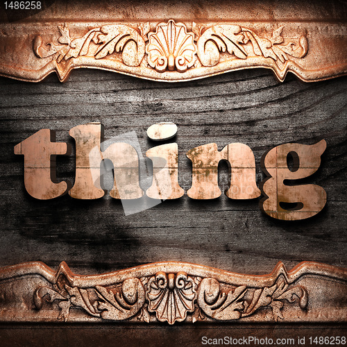 Image of Golden word on wood