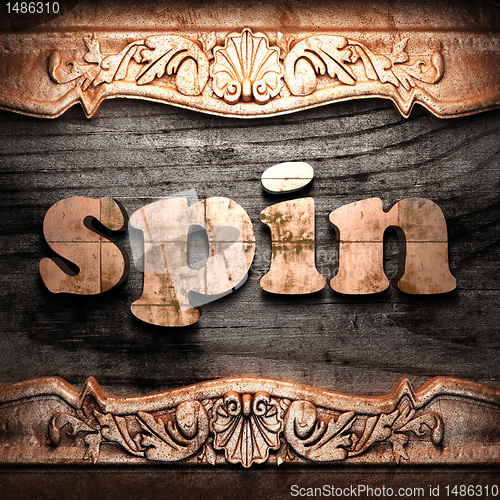Image of Golden word on wood