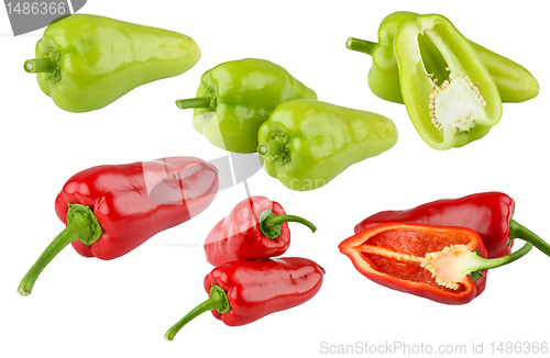 Image of Green and red peppers on white background
