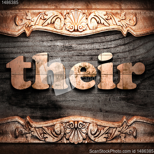 Image of Golden word on wood