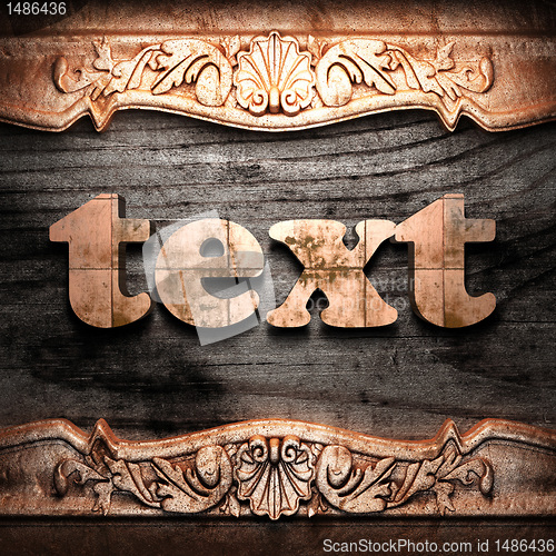 Image of Golden word on wood