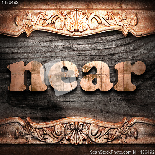 Image of Golden word on wood