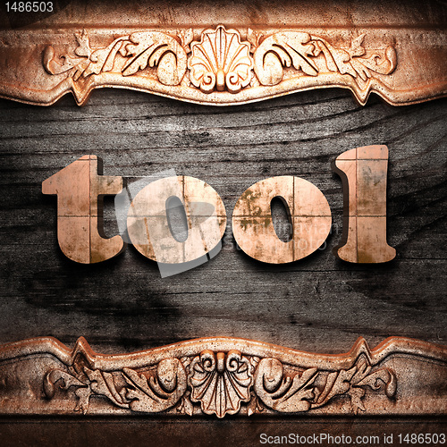 Image of Golden word on wood