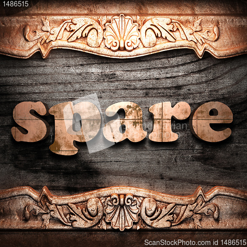 Image of Golden word on wood