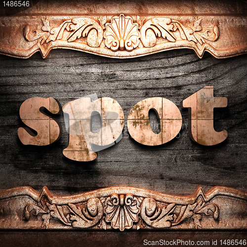 Image of Golden word on wood