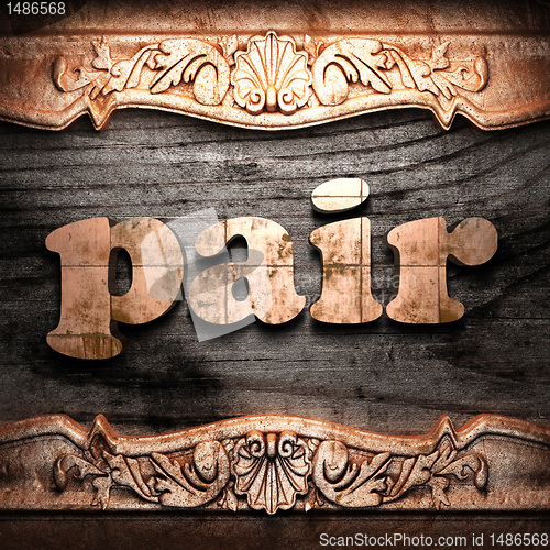 Image of Golden word on wood