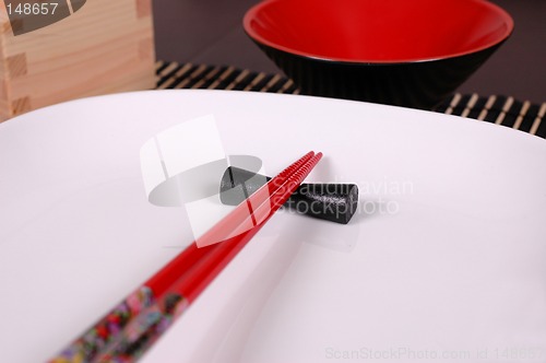 Image of Chopsticks on white plate