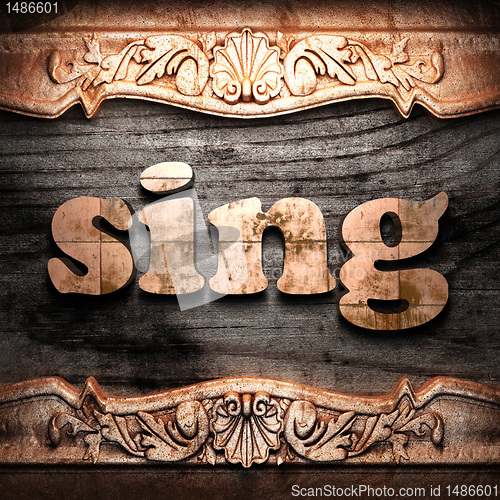 Image of Golden word on wood