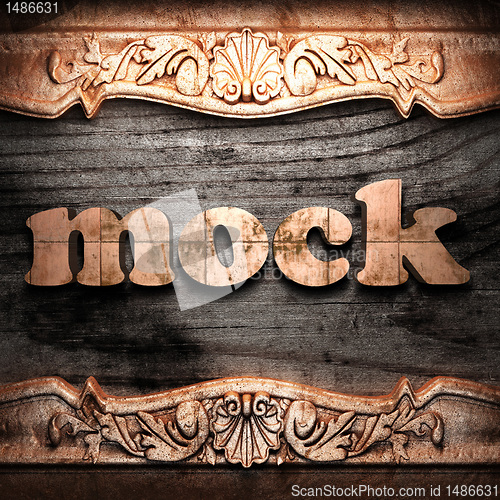 Image of Golden word on wood