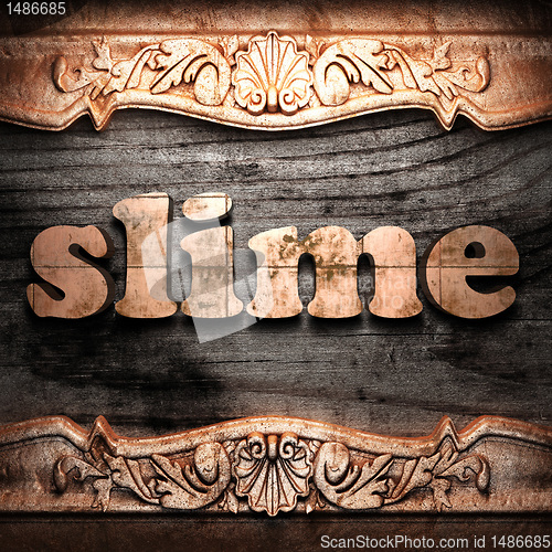 Image of Golden word on wood