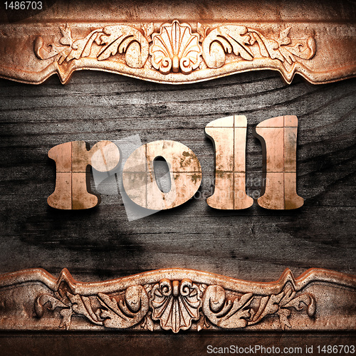 Image of Golden word on wood