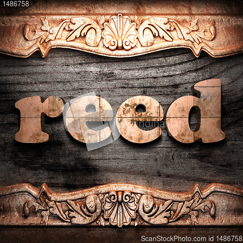 Image of Golden word on wood