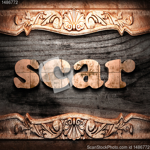 Image of Golden word on wood