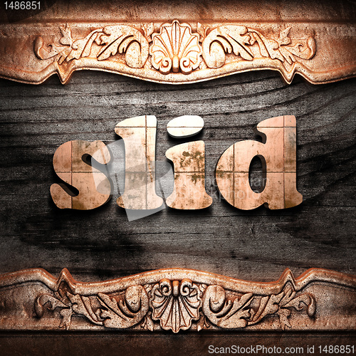 Image of Golden word on wood