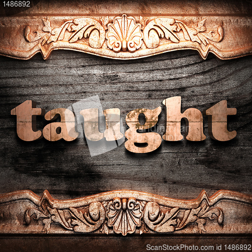 Image of Golden word on wood