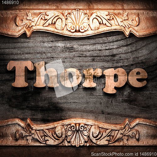 Image of Golden word on wood