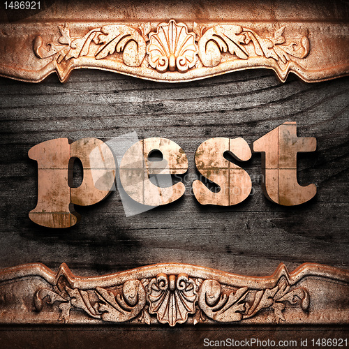 Image of Golden word on wood