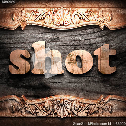 Image of Golden word on wood