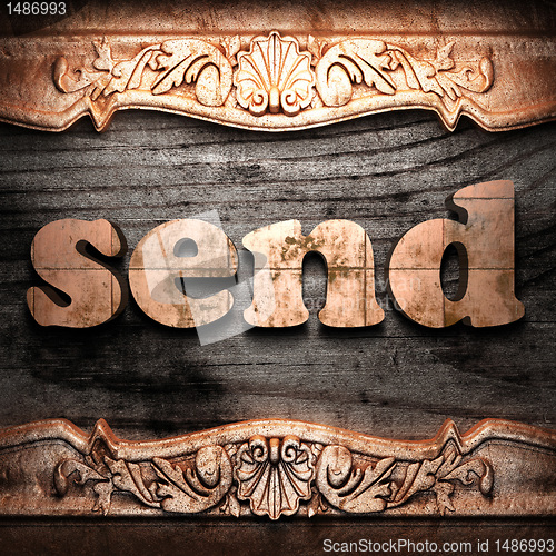 Image of Golden word on wood