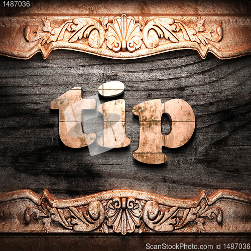 Image of Golden word on wood