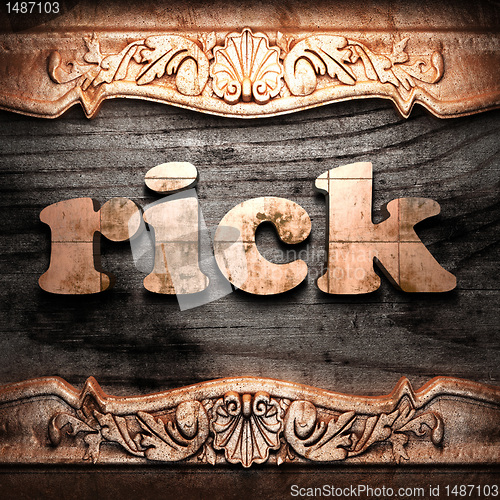 Image of Golden word on wood
