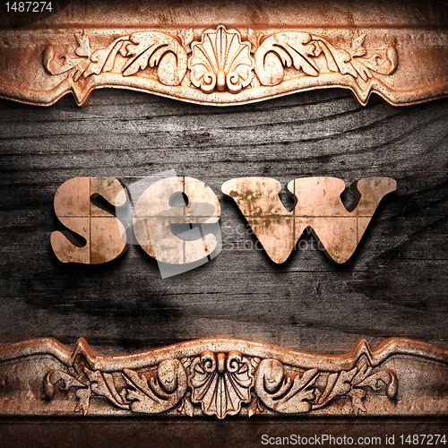 Image of Golden word on wood