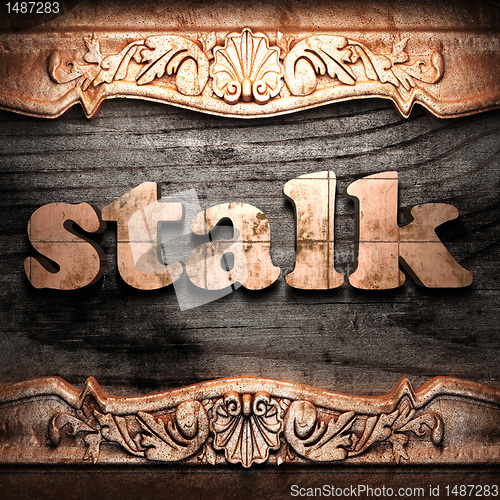 Image of Golden word on wood